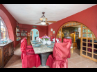 04  Villa Hansen - Formal Dining Room with Seating for 10 and Rear Garden Views