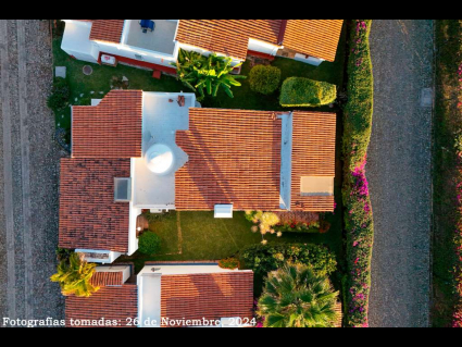 16---Red-Clay-Tile-Roofs-on-the-House-and-Terraces-and-Generous-Gardens