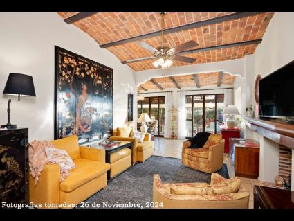 03---Stylish-LivingRoom-with-Fireplace-leads-to-Double-Sliding-Doors-and-the-South-Facing-Terrace