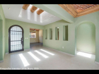 05--Entrance-Foyer-with-Archetectural-Features-like-Beamed-Skylight-and-Art-Niche-Windows