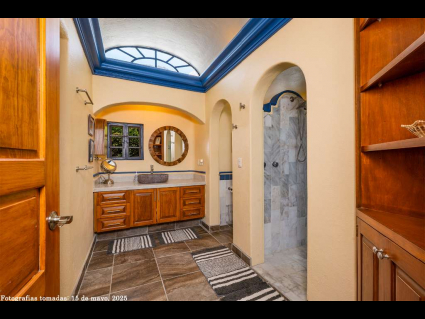 09 - Master Bath has a Barrel Vault Ceiling and a Marble Clad Walk In Shower