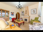 13 - Living Room with Gas Fireplace Leads to Ground Floor Bedrooms
