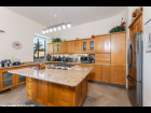 03 - Modern Kitchen with Blond Cabinets and Frosted Glass