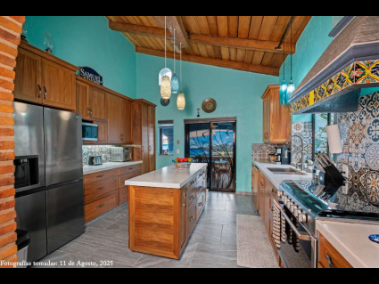 06 - Kitchen flows to the South Facing Pool Lanai