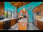 03 - Renovated Kitchen with Cathedral Ceiling flows from the Dining Room and Wine Bar