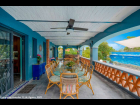 01 - Poolside Lanai with Dining, Living and Outdoor Kitchen