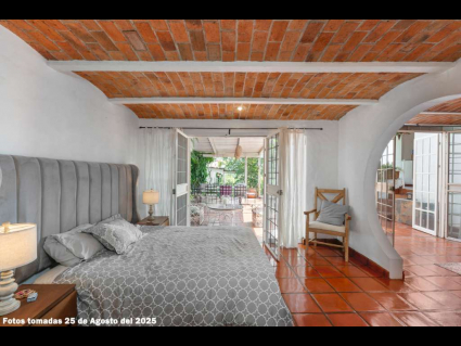 08---Main-House-Lower-Suite-Leads-to-OutDoor-Sitting-Terrace-with-Lake-View