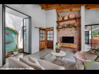 13----Penhouse-Living-Room-with-Solararium-Fountain-Courtyard-and-Lake-View-Terrace