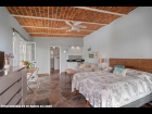09---Casita-Bedroom-Is-Pool-Side-with-Full-Bath,-Terrace-and-Lakeview-Screened-Porch