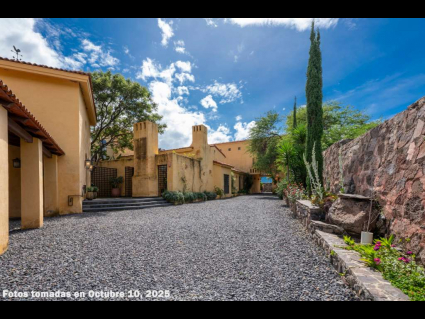 06 - The Estate Entrance Leads Under the Porte-cochère to the Motor Court