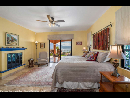 06 - Master Suite with Fireplace, Lakeview, and South Terrace Slider