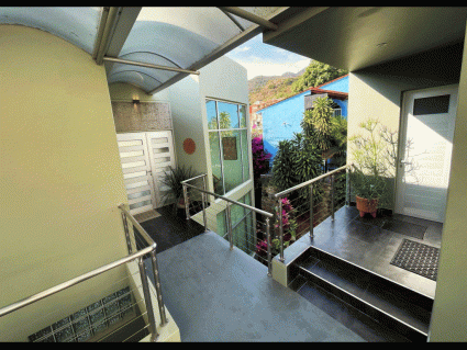 Main entrance, Parking for 2 cars Half Bath and Flex Room area 