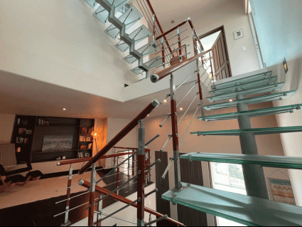 Stair Case that leads you to main Bedroom, Secondary Bedrooms 