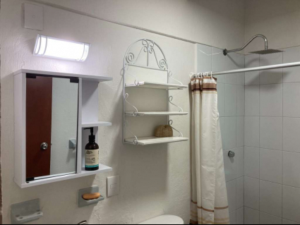 25. Baño espejo