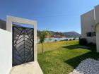 Entrada y Jardin