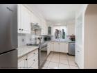 09---Light-and-Bright-Kitchen-with-Skylight,-Garden-View-and-Seperate-Laundry--Pantry