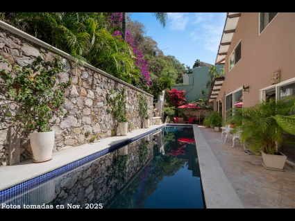 12---Pool-Terrace-is-viewed-by-both-Second-Floor-Bedrooms,-Living,-Dining-and-Kitchen