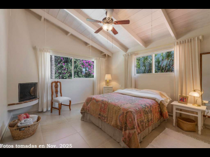 10---Second-Floor-West-Bedroom-has-Soaring-Ceilings-and-Fireplace