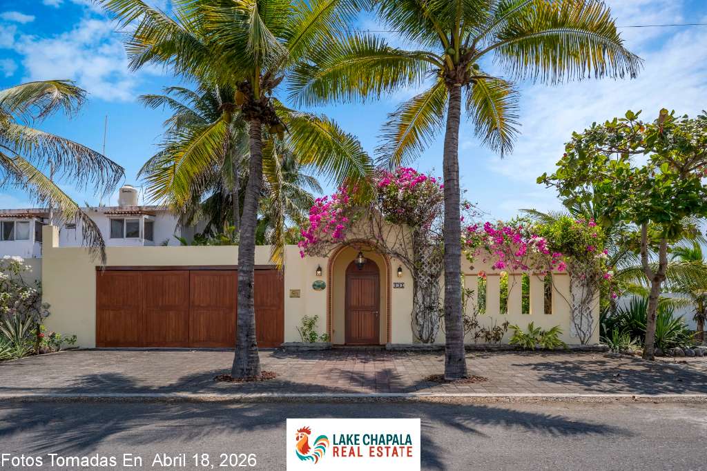 04 - Charming Street Facade with Double Garage, Tropical Palms and Fuisha Bugambillia