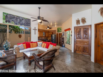 11---Open-Concept-Living-Room-Flows-to-Kitchen-and-Lanai