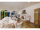011 Den with Fireplace leading to Courtyard