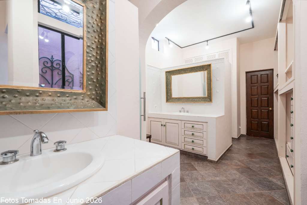 012 - Ground Floor Master Bath with Dual Vanities and Dream Closets