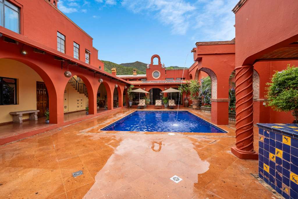 002 - Main Pool Courtyard with Aquaduct Fountain and Portallis