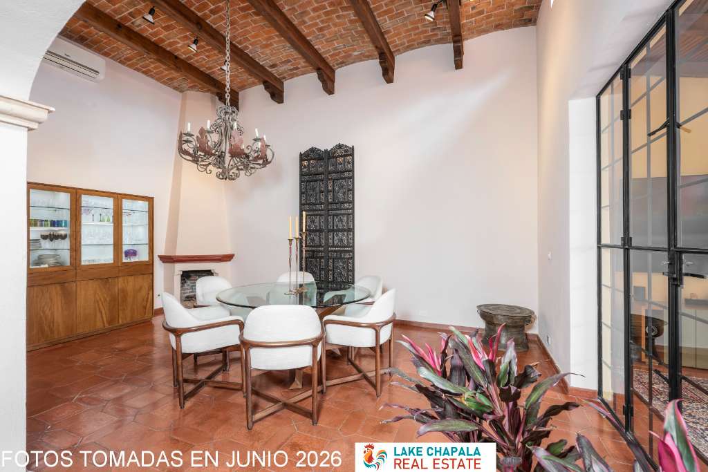 004 - Dining Room with Beamed Ceiling and Fireplace
