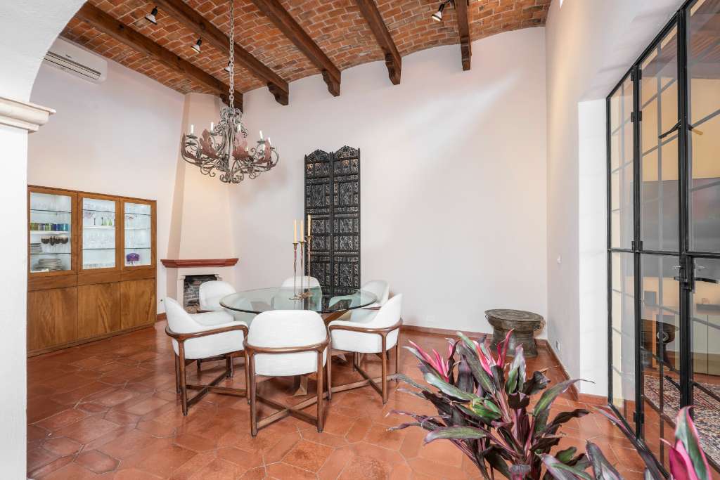 004 - Dining Room with Beamed Ceiling and Fireplace