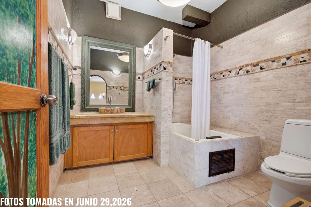 11 - Guest Bath with Tub Shower