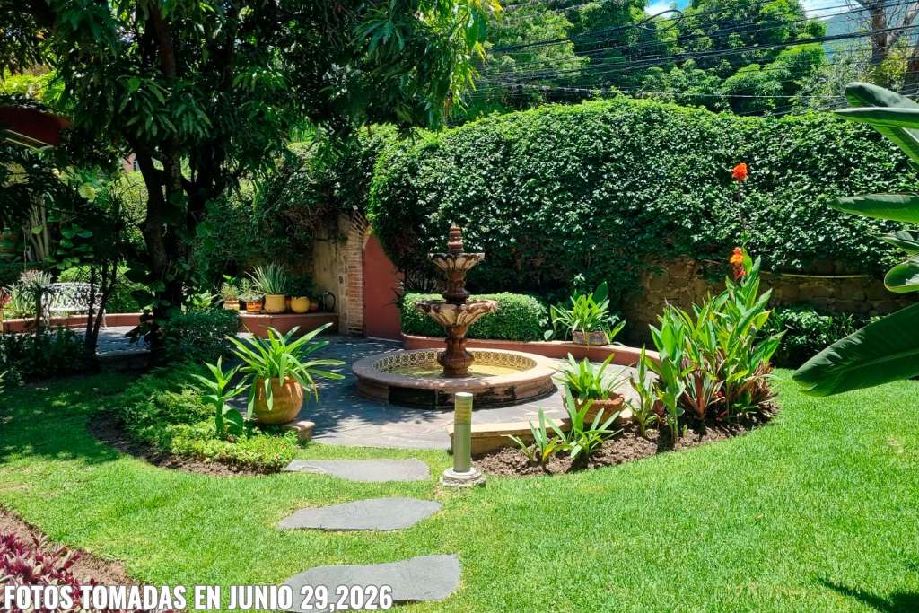 01- Lush Front Garden with Cantera Stone Fountain and Flagstone Terrace