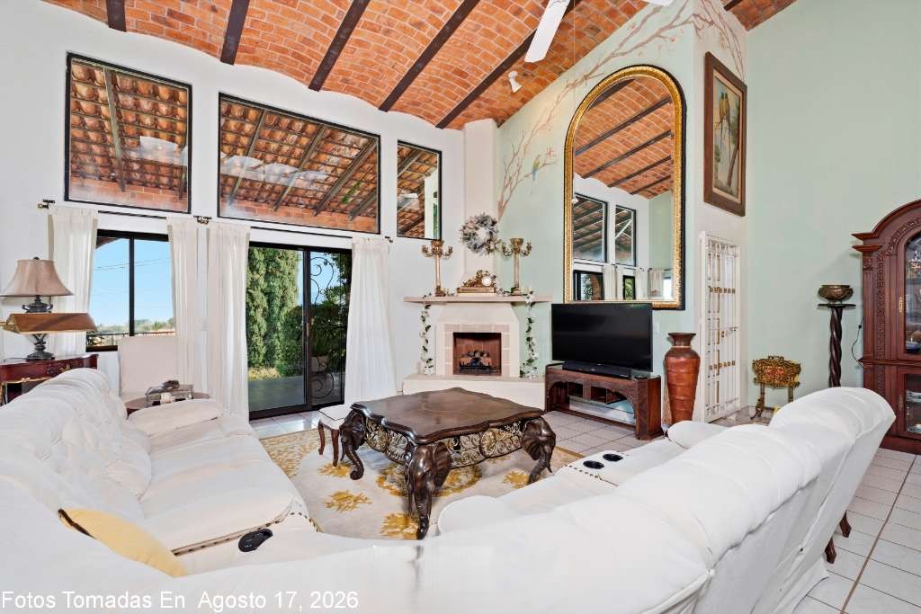 008 - Sala with Lake View, Terrace Access, Soaring Ceilings and Fireplace