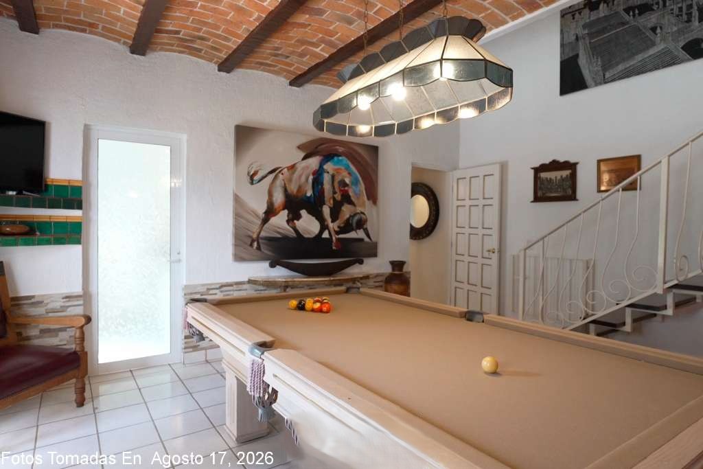 016 - Main Floor Billiard Room off the Great Room has a Private Garden Terrace and Full Bath