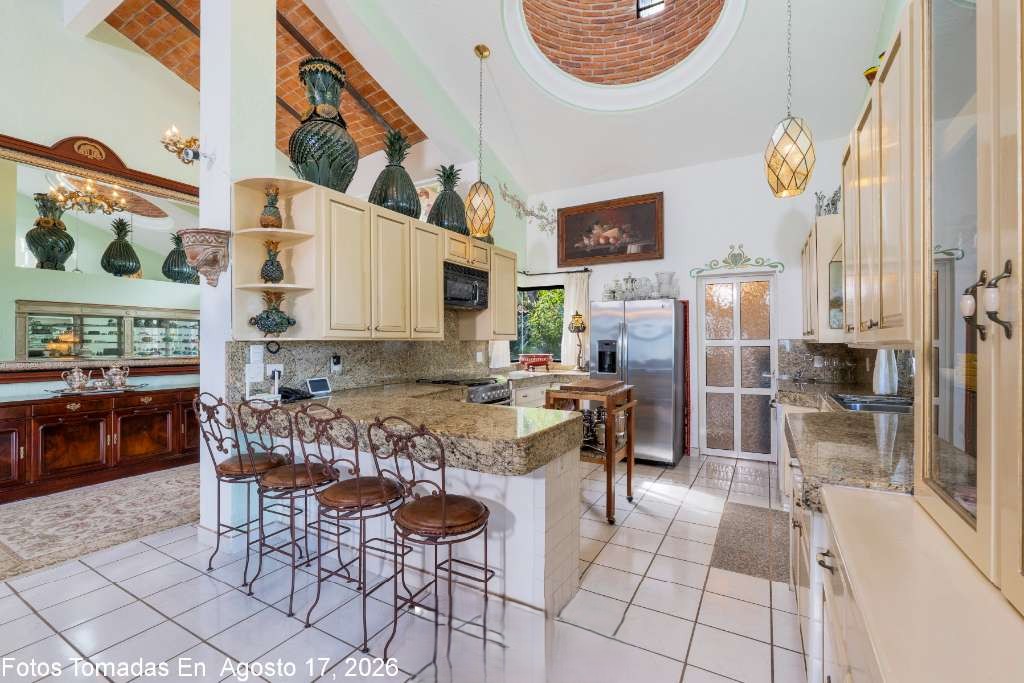 006 - Open Concept Kitchen with Garden Views and Terrace Access