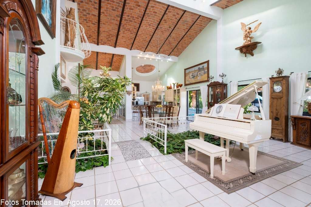 007 - Great Room Flows to Terrace and Features Five Skylights Over the Interior Tropical Garden