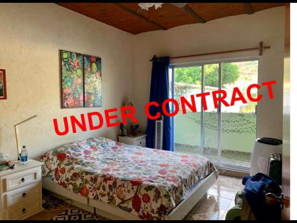 UNDER CONTRACT