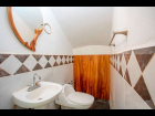 10.- Medio Baño