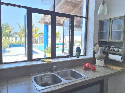 07 Kitchen with Pool and Ocean View