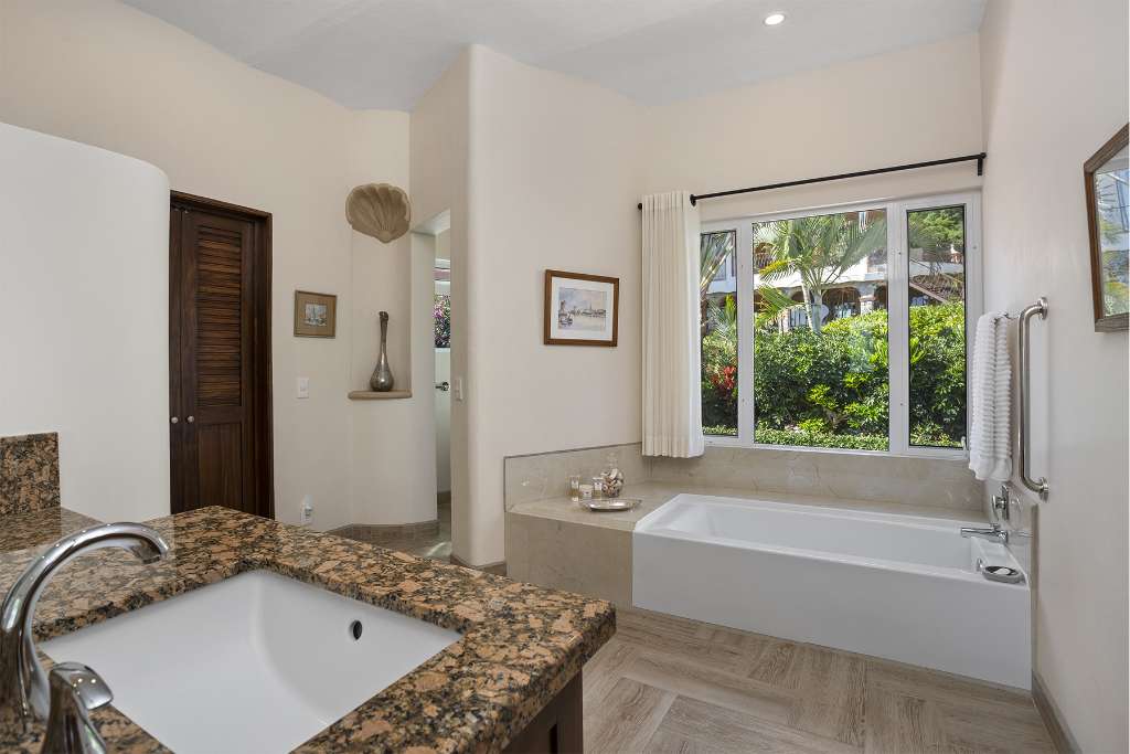 09 - Master Bath Features a Soaking Tub with Mountain Views