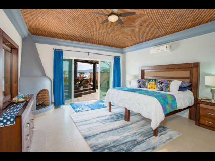 02 - Master Bedroom with Lake View, Fireplace and Brick Domed Ceiling